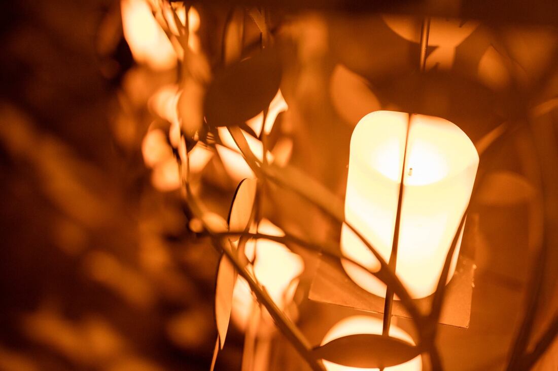 Lanterns lit at night - winter outdoor decor