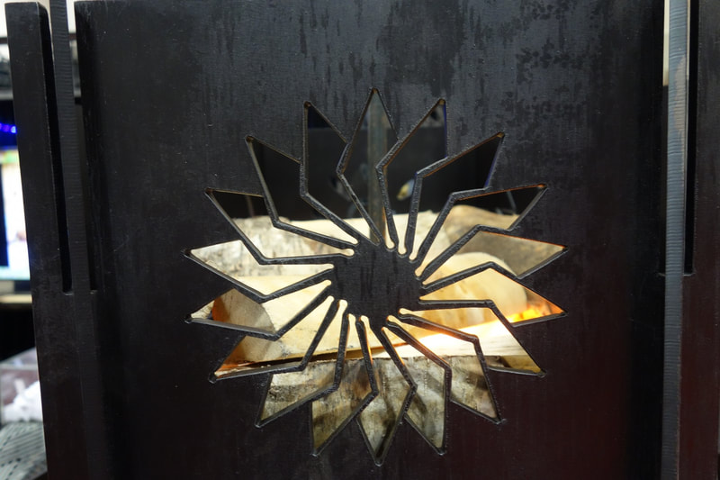pinwheel sun steel firepit panel