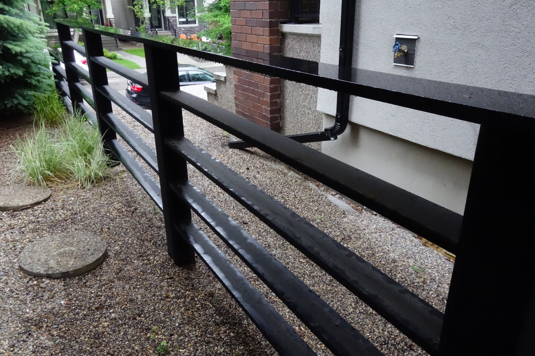 custom black steel fence