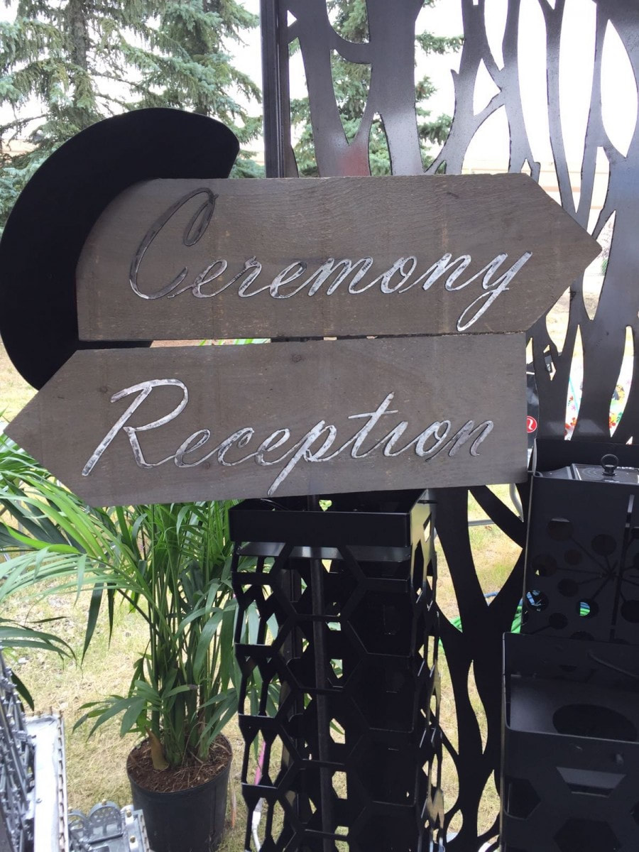 steel directional sign for wedding reception