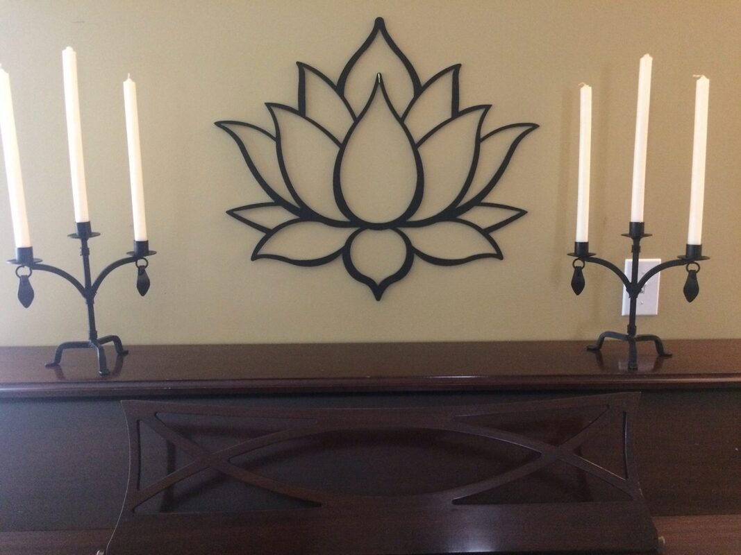 steel lotus decoration over piano