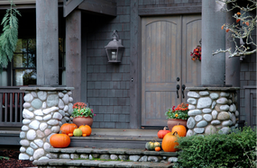Fall 2021 design trends - pumpkins on steps of porch